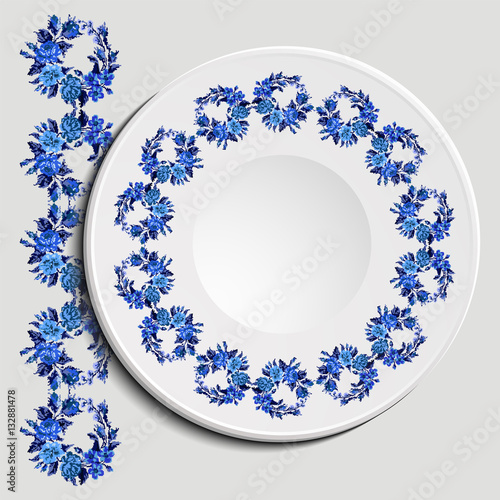 Table appointments in restaurant.. Decorative plate with round ethnic ornament. Ukrainian style.   Vintage background of napkin with floral pattern (roses, chamomile and cornflowers). Blue tones.