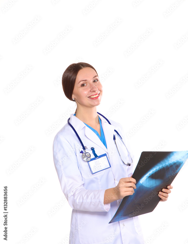 Young woman doctor examines the X-rays. Isolate Young woman doctor examines the X-rays. Isolate
