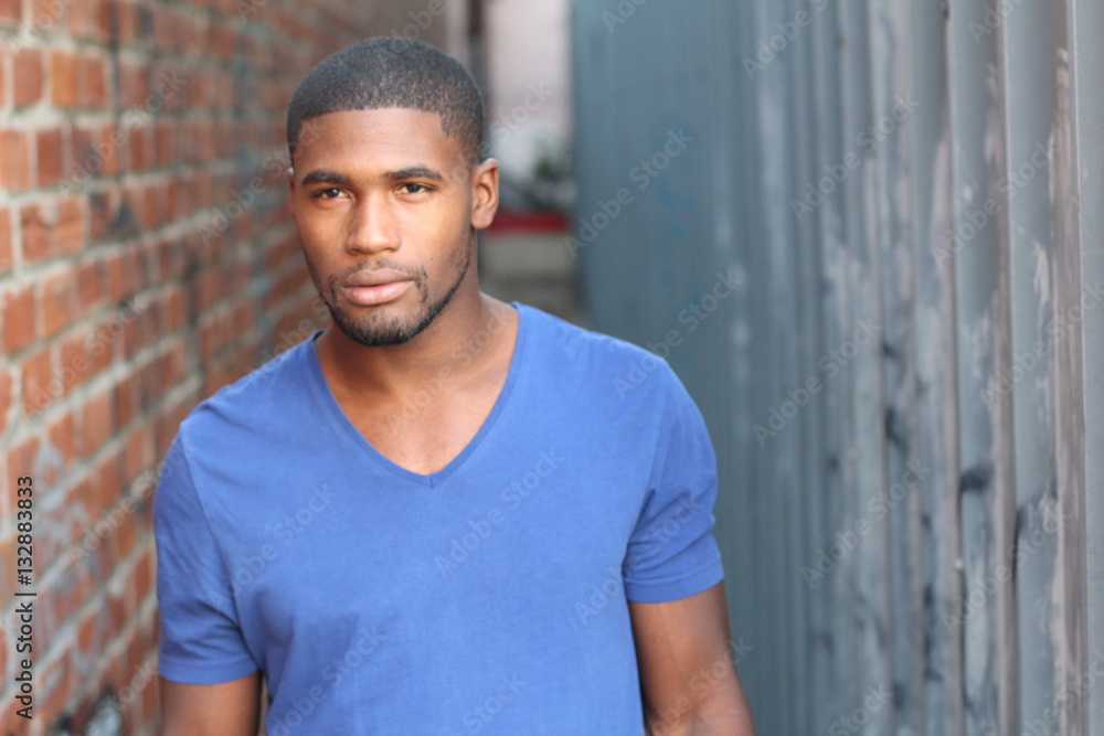 Gorgeous African man close up with copy space Gorgeous African man close up with copy space