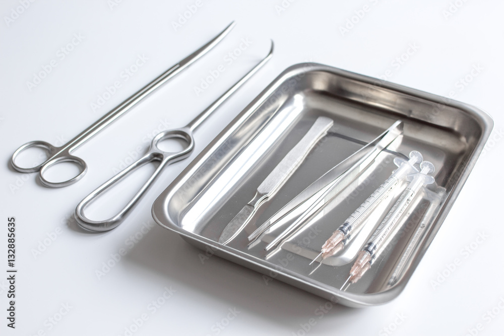 instruments for plastic surgery on white background instruments for plastic surgery on white background