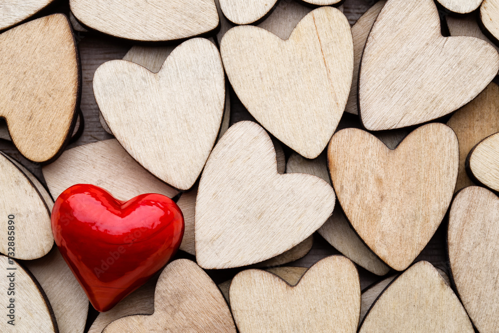 Obraz premium Wooden hearts, on the heart background.