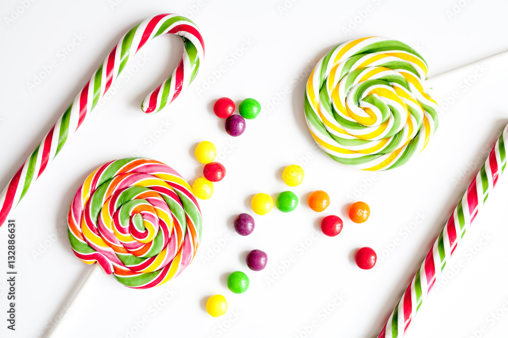 sweets and sugar candies on white background top view sweets and sugar candies on white background top view