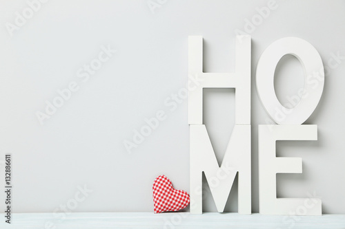 Word home of the decorative letters on wooden table photo