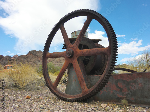 Big rusty industrial metal wheel