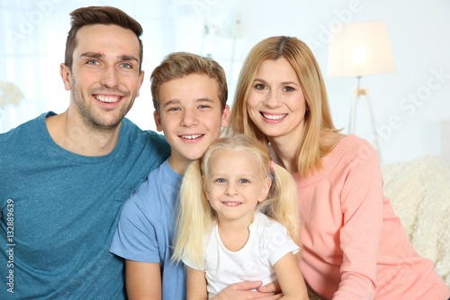 Cute happy family in living room