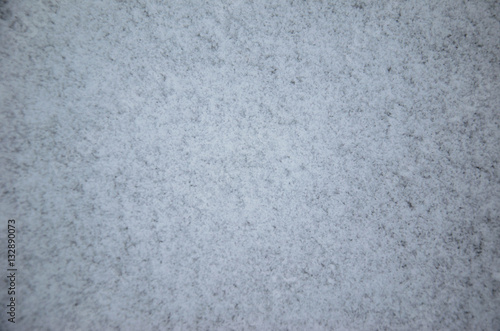 Texture of white snow as a background