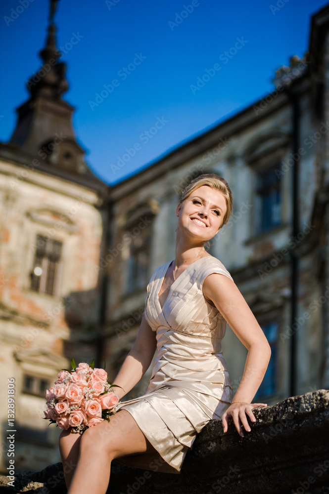Beautiful bride with bouquet before wedding ceremony Beautiful bride with bouquet before wedding ceremony