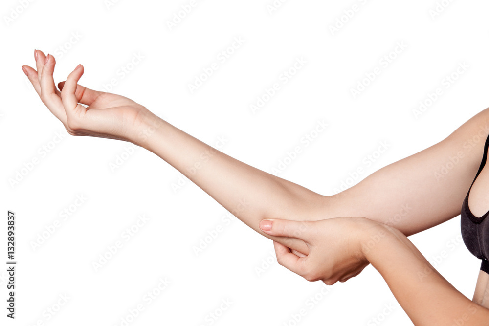 Closeup view of a young woman with elbow pain. isolated on white background.
