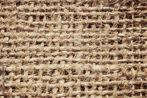 Textured background of a brown burlap bag, close up