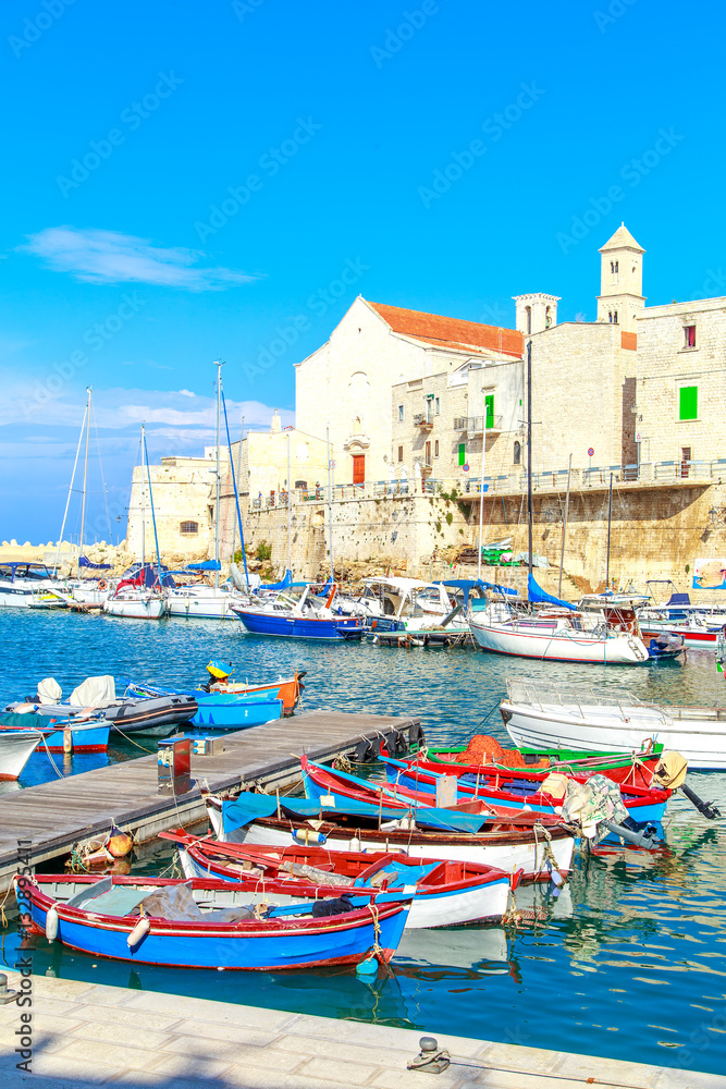 Obraz premium Fishing boats in small port Giovinazzo near Bari, Apulia, Italy