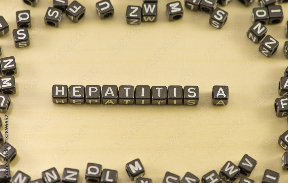 Hepatitis A word on a wooden background Hepatitis A word on a wooden background