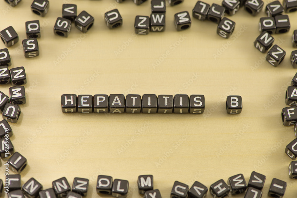 Hepatitis B word on a wooden background Hepatitis B word on a wooden background