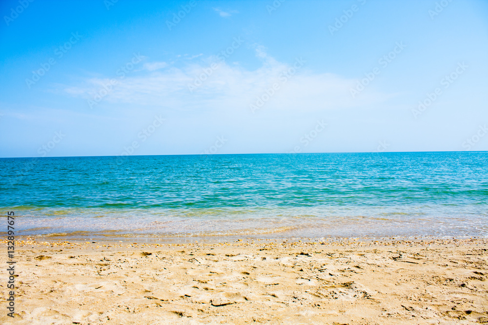 Adriatic Sea coast view. Seashore of Italy, summer sandy beach with clouds on horizon.