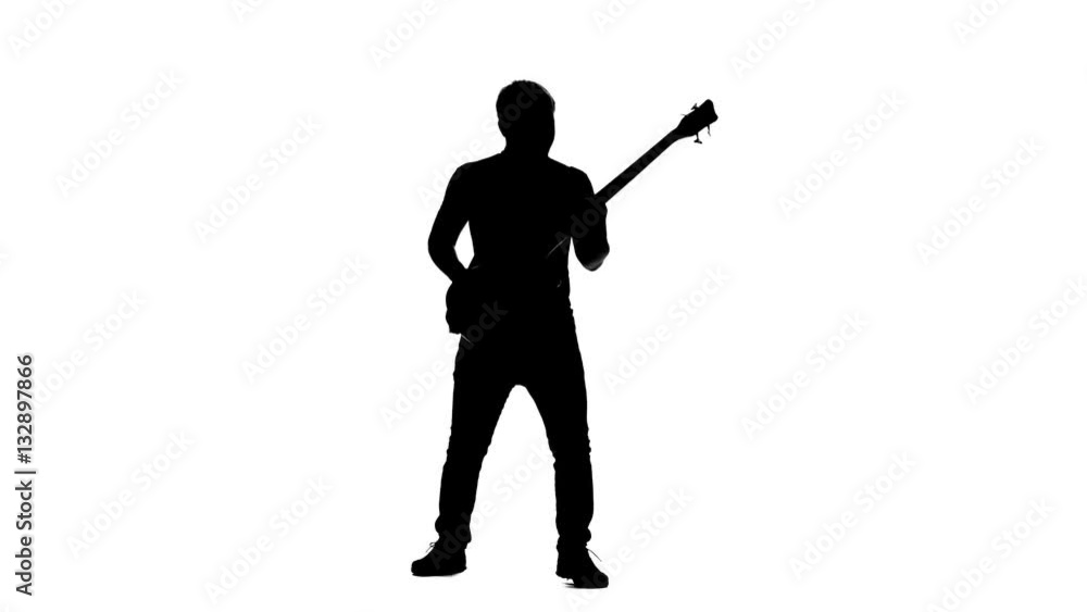 Silhouette bass guitarist playing on her knees. Alpha channel studio Silhouette bass guitarist playing on her knees. Alpha channel studio