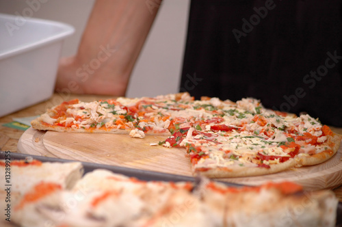 Pizza on wooden table 