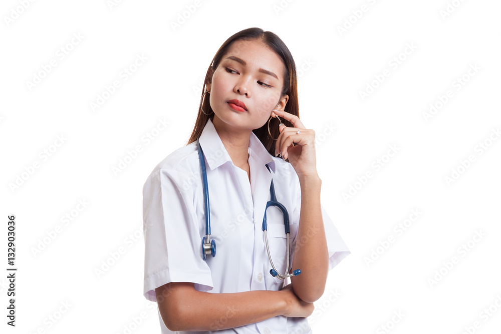 Asian young female doctor thinking looking up. Asian young female doctor thinking looking up.