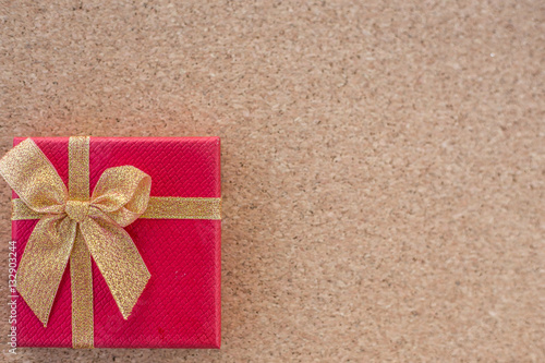 gift boxes and ornaments on brown wood paper background, top view background © nipol