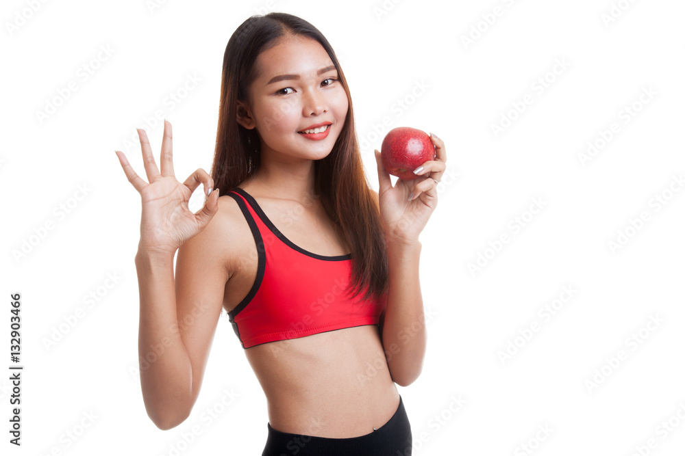 Beautiful Asian healthy girl show OK sign with apple. Beautiful Asian healthy girl show OK sign with apple.