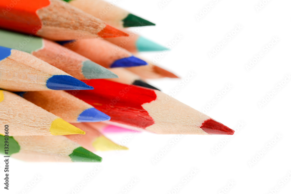 The peaks of crayons arranged on the table The peaks of crayons arranged on the table