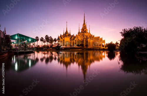 Beautiful twilight in temple at Wat None Kum in Nakhon Ratchasima province Thailand. © pong0402