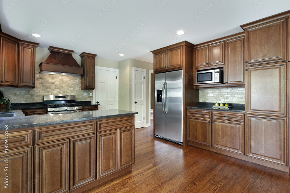 Fototapeta premium Kitchen with oak wood cabinetry