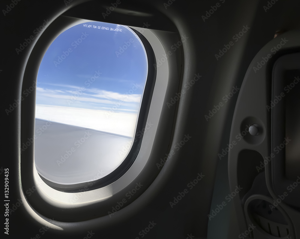 Looking Out from the window of the aircraft.