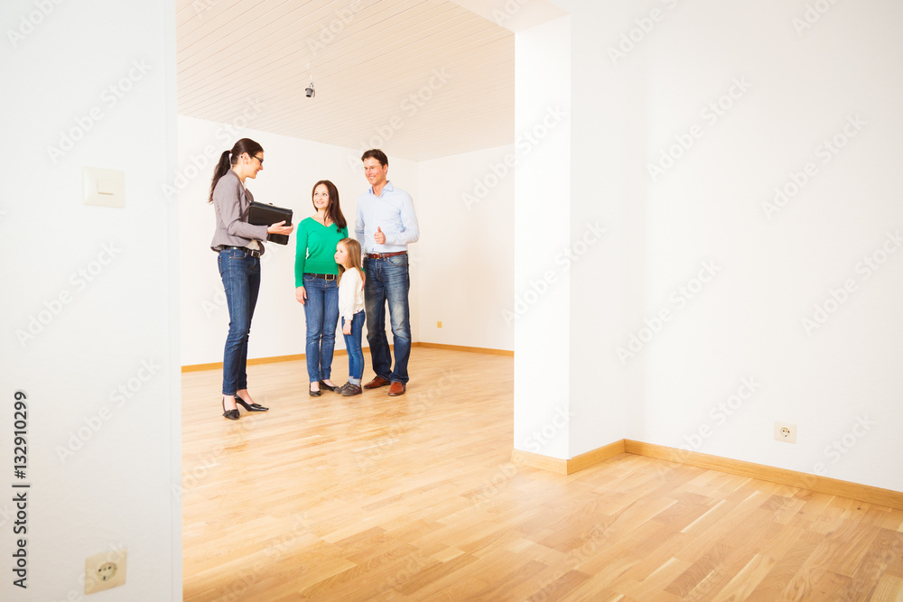 Realtor Showing Customers An Apartment Realtor Showing Customers An Apartment
