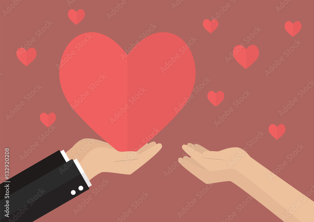 Man giving heart to a woman Man giving heart to a woman