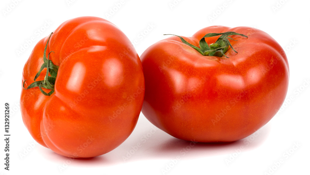 two tomatoes on a white background