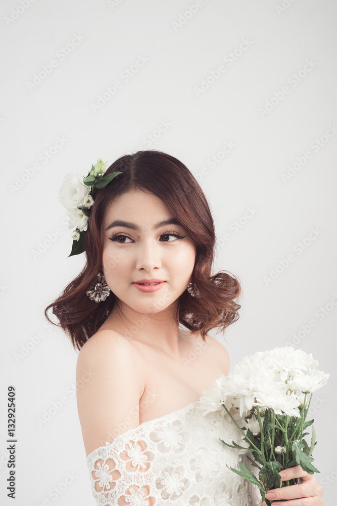 Beautiful asian woman bride on grey background Beautiful asian woman bride on grey background