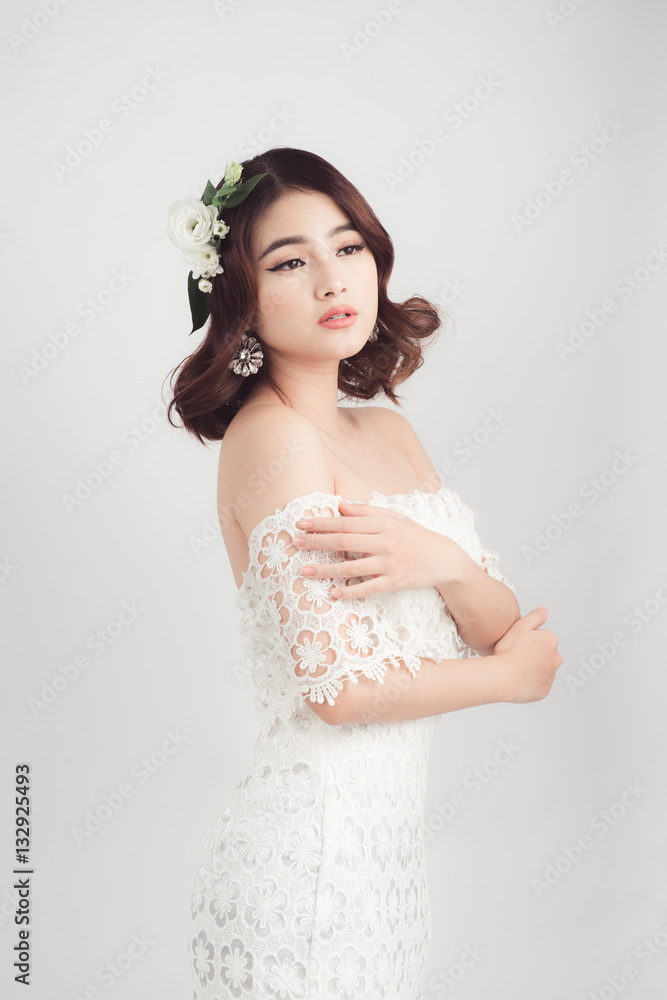 Beautiful asian woman bride on grey background Beautiful asian woman bride on grey background