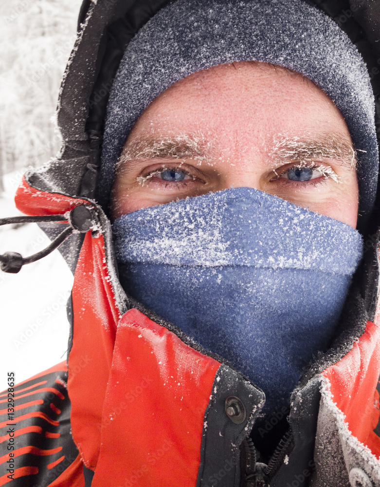 frozen man face in winter scene