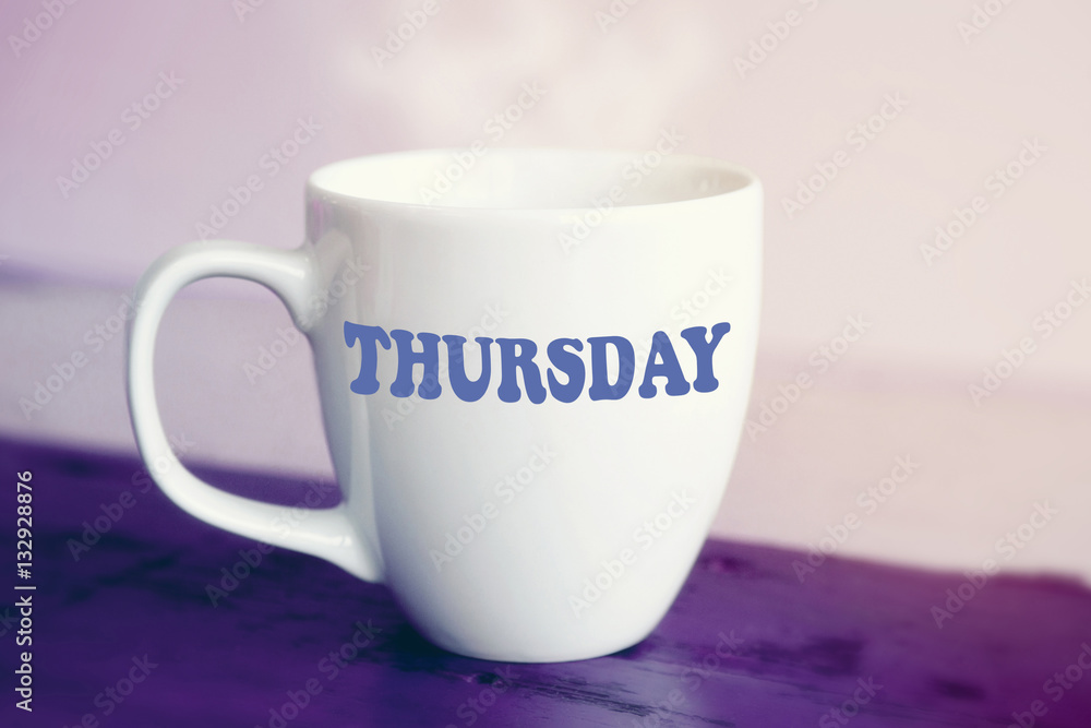 white cup with the word Thursday on it white cup with the word Thursday on it