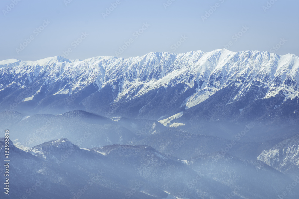 Winter landscape over the Piatra Craiului Mountains in Brasov co