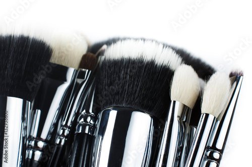 Makeup brushes on white background