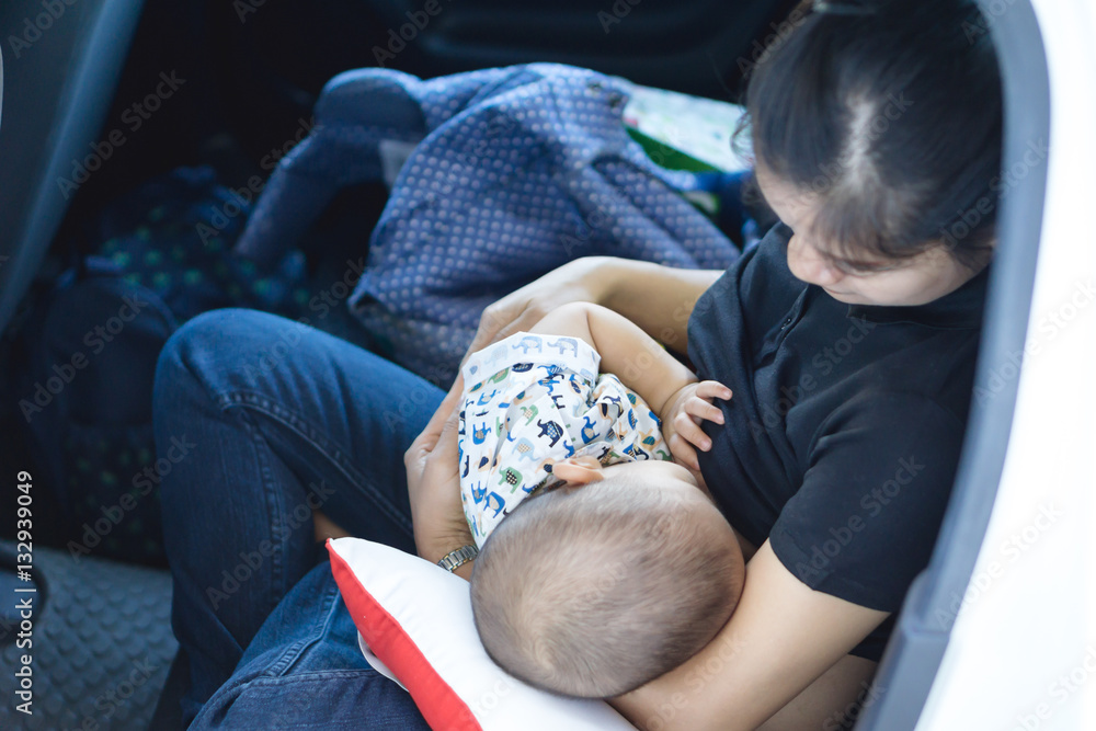 A year old Asian baby Breastfeeding A year old Asian baby Breastfeeding