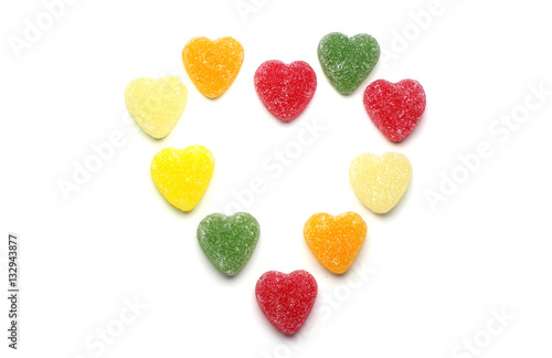 Multicolored hearts candy forming big heart