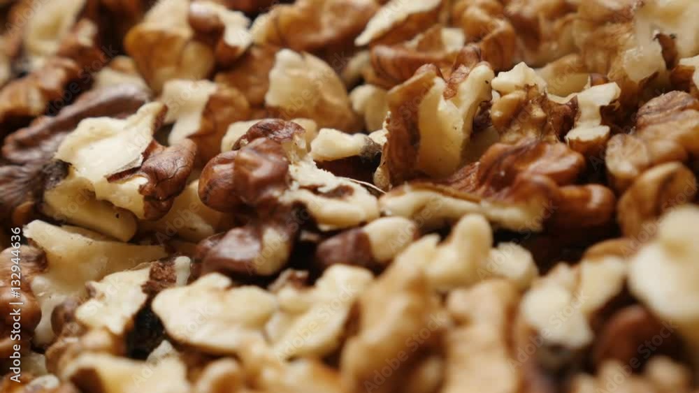 Juglans regia fruit ingredient pieces 4K 2160p 30fps UltraHD panning footage - Pile of walnut out its shell food slow pan background 3840X2160 UHD video Juglans regia fruit ingredient pieces 4K 2160p 30fps UltraHD panning footage - Pile of walnut out its shell food slow pan background 3840X2160 UHD video