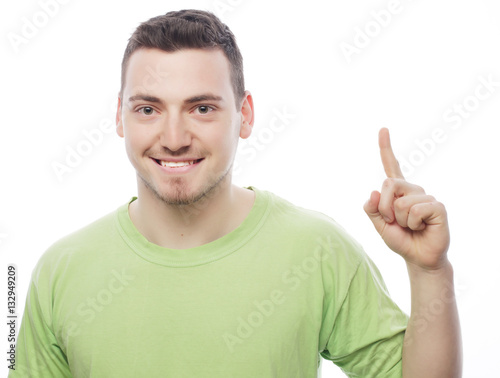 happy young man in green t-shirt