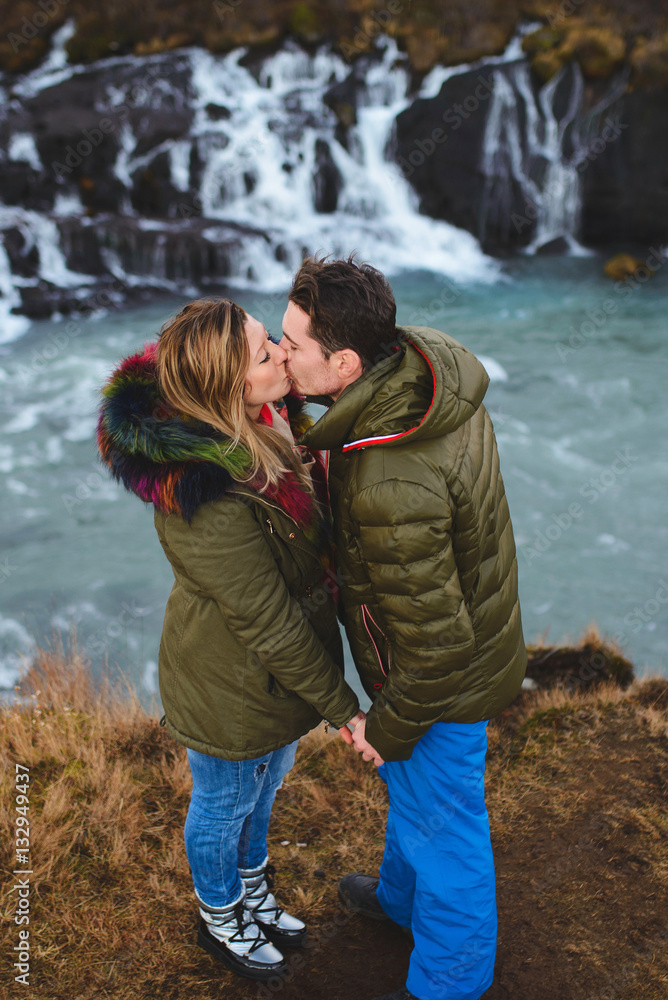 Kissing Couple at Waterfall in Iceland