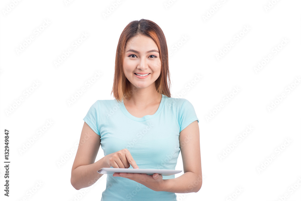 Portrait of a smiling asian woman with tablet isolated on white Portrait of a smiling asian woman with tablet isolated on white