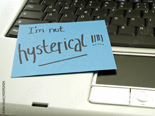 Memo note on notebook, I am not hysterical photo