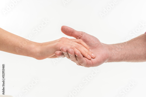 Male hand holding female hand