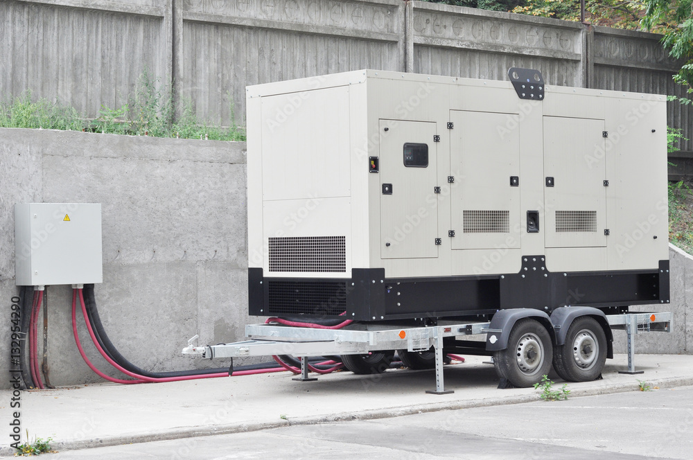 Industrial Diesel Generator. Standby generator. Industrial Diesel Generator for Office Building connected to the Panel Wire. Backup Generator Stock Photo | Adobe Stock