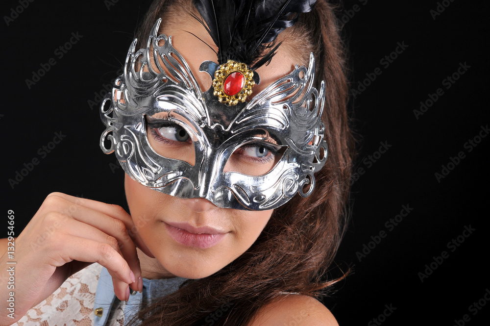 beautiful young women with venetian mask