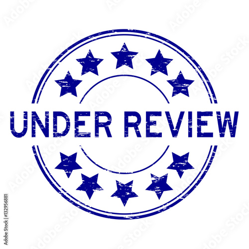 Grunge blue under review with star icon round rubber stamp