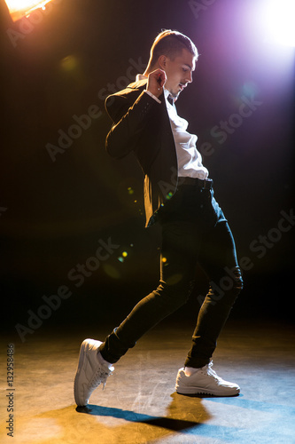 Stylish man dancing © LIGHTFIELD STUDIOS