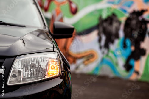 turn signal headlight of black car