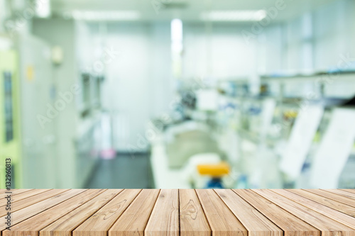 wood floor on blur laboratory for background