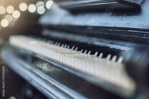 Vintage old piano. Close-up of keyboard keys photo